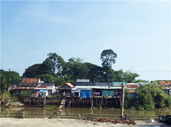 Mekong Delta landscape with big fishing net in floating water season in  Chau Doc, An Giang province, Mekong Delta, South Vietnam Stock Photo